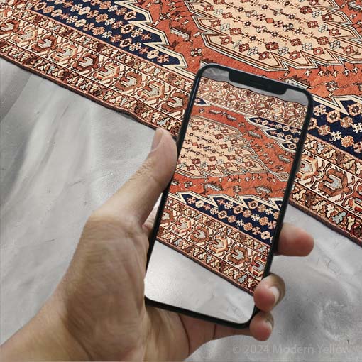 Image of phone taking pictures of area rug to send for an estimate